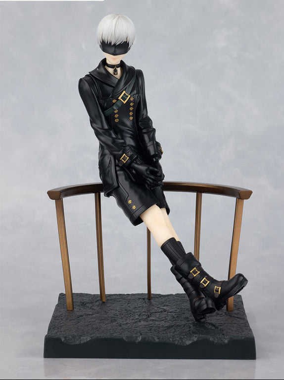 Side view leg extended FuRyu Tenitol NieR Automata Ver1.1a 9S figure on railing, black tactical YoRHa attire gloves high boots silver hair goggles Pod ready android pose