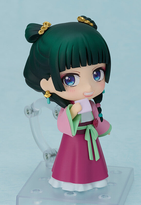 Good Smile Nendoroid Maomao Garden Party Version back view dark green hair twin buns gold hairpins pink ruqun dress green details on articulated stand The Apothecary Diaries Kusuriya no Hitorigoto chibi figure GSC2070