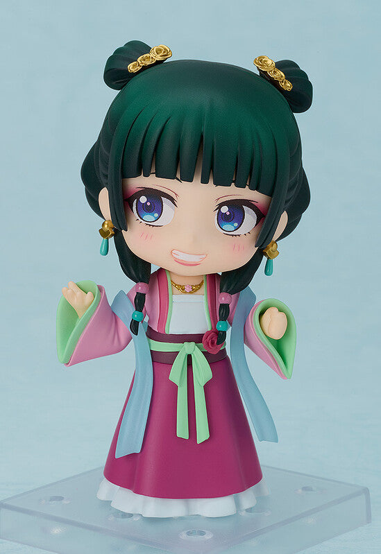 Good Smile Nendoroid Maomao Apothecary Diaries Garden Party Ver hands clasped pose neutral face dark green twin buns gold hairpins pink qixiong ruqun green sleeves blue gradient background GSC2070 Kusuriya no Hitorigoto chibi