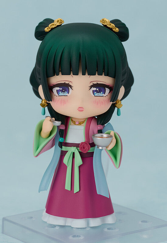 Good Smile Nendoroid Maomao Apothecary Diaries Garden Party Ver holding teacup pose smiling blush face dark green twin buns gold ornaments pink ruqun hanfu green sash blue gradient backdrop GSC2070 chibi figure