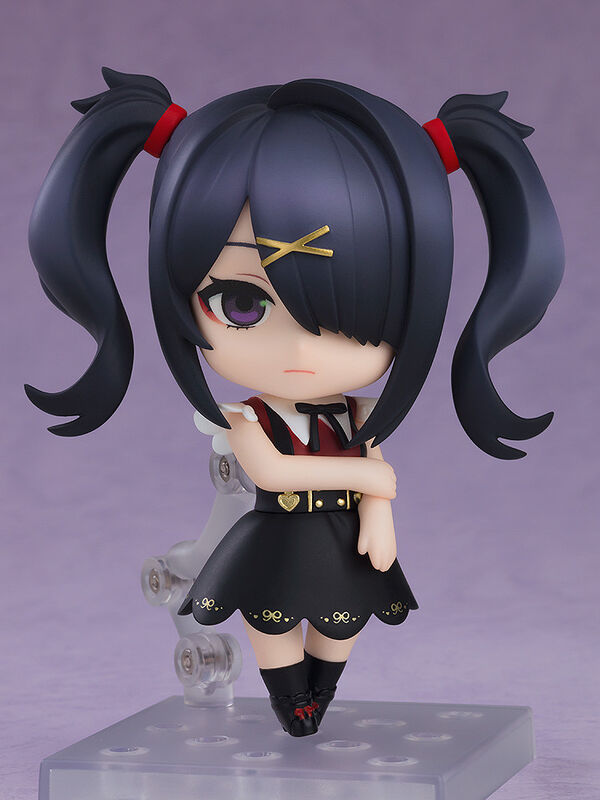 Good Smile Pop Up Parade Kizuna Akari figure side view on clear display base, black twin tails red ribbons cross pupils angry face sailor uniform black skirt thigh-highs arms-crossed pose chibi collectible